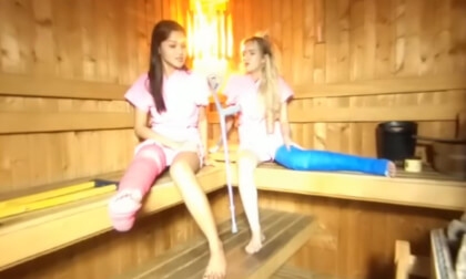2 Girls With Long Cast Leg In Sauna (LCL)