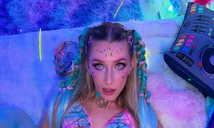 Emily Jade Rides Cowgirl As Her Iridescent Outfit Shimmers Under Neon!